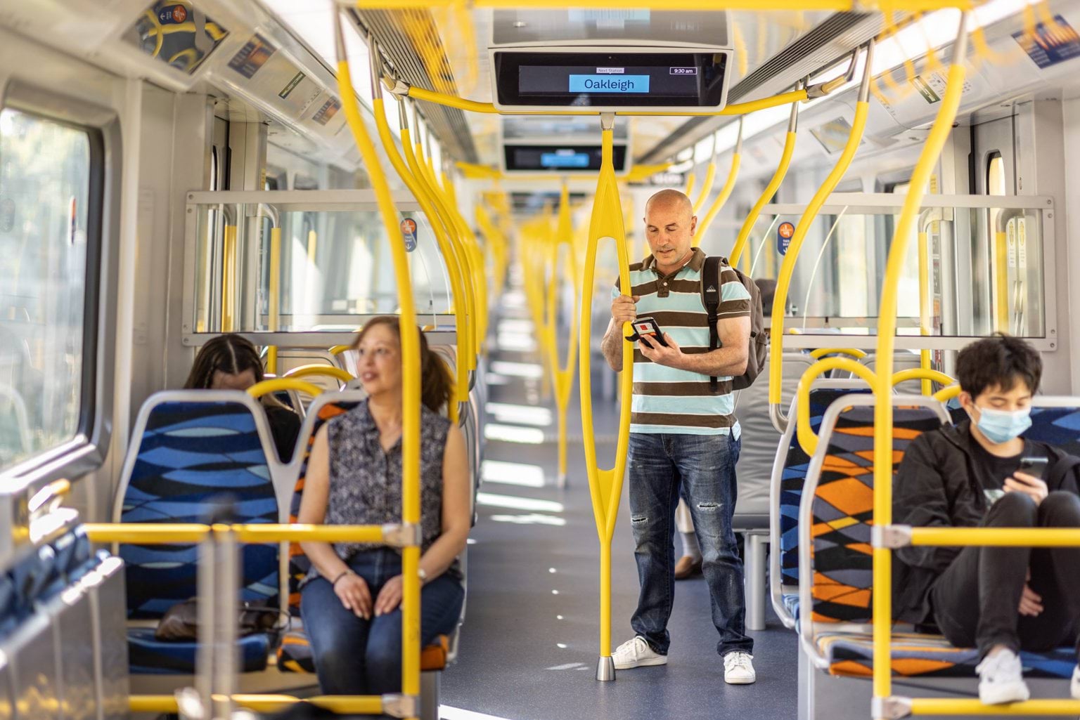 Photograph of passengers in a train carriage